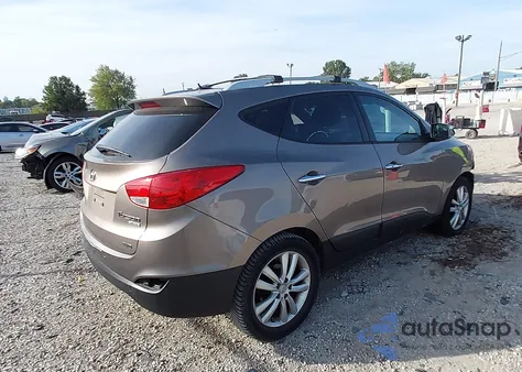 2013 Hyundai Tucson Limited z USA, uszkodzony, nr VIN KM8JUCAC4DU621111